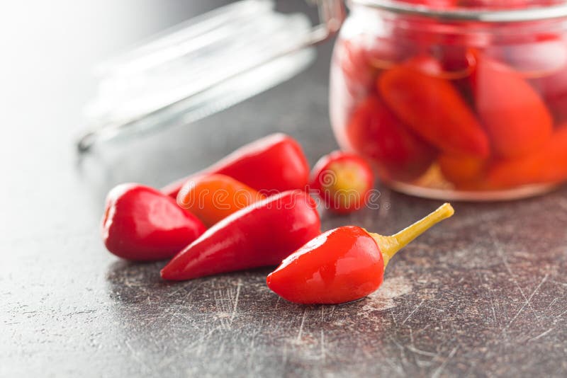 Pickled chili peppers stock image. Image of cooking 149655729