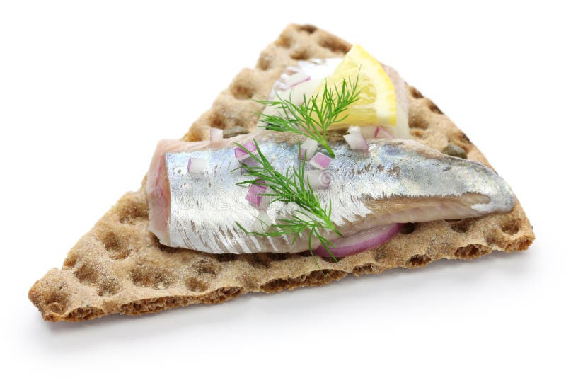 Pickled herring on crisp bread