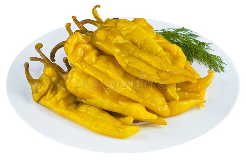 Pickled jalapeno in white plate stock photography Pickled jalapeno in white plate stock photography