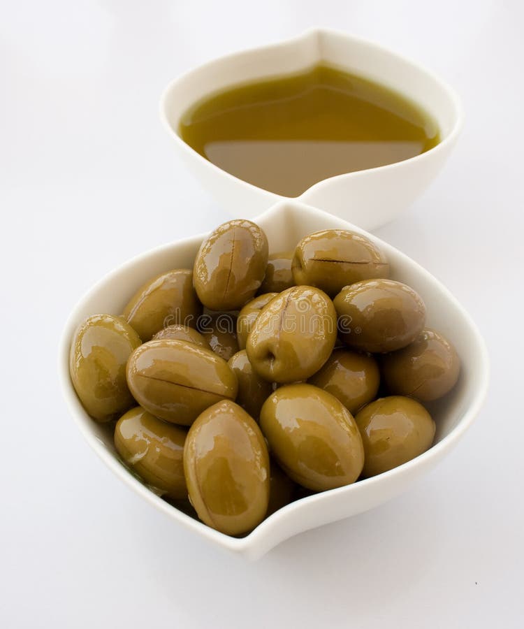 Pickled Olives Inside the Jar with Black Seed and Mustard Oil Stock