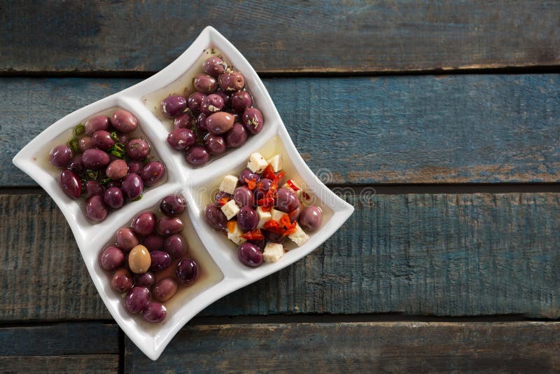 Pickled olives in platter stock image. Image of greek 95862743