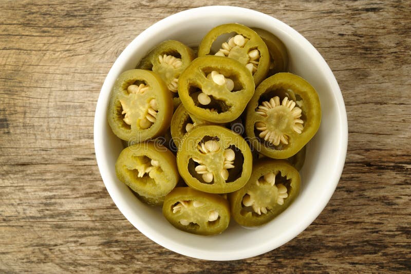 Pickled sliced green jalapeno peppers royalty free stock photography Pickled sliced green jalapeno peppers royalty free stock photography