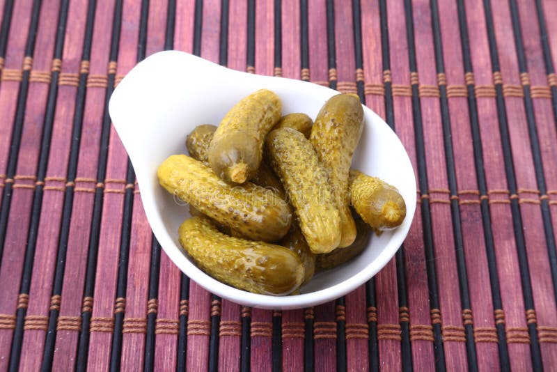 Pickles. Bowl of Pickled Gherkins Cucumber with Copy Space. Cornichons