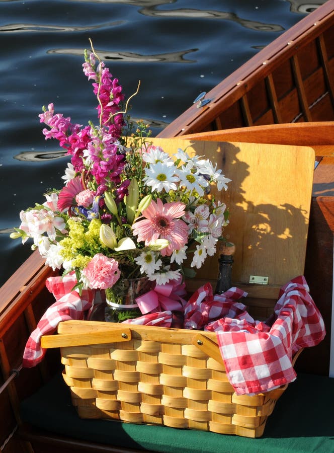 Picnic Basket With Flowers - On A Wooden Boat Stock Photo 