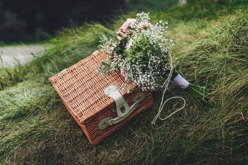 Picnic Basket with Wild Flowers on the Grass Stock Photo Image of
