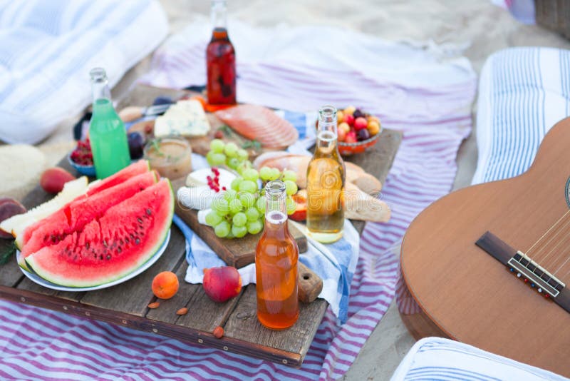 Picnic on the Beach at Sunset in the Style Boho, Food and Drink