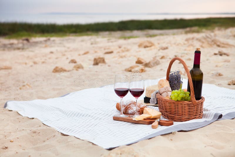 Summer Picnic on the beach at sunset in the white plaid, food and drink conception. Raspberry basket stock images, royalty-free photos and pictures