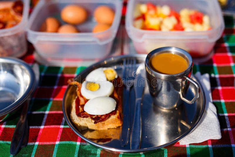 Bush Breakfast Coffee Being Poured From A Campfire Billy Stock Photo