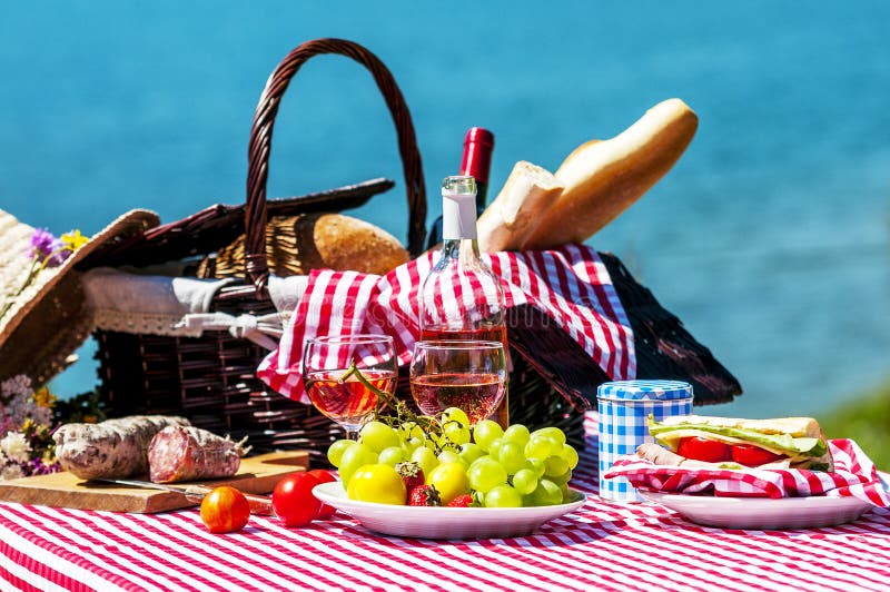 Picnic near a lake stock photo. Image of green, flowers 36601034