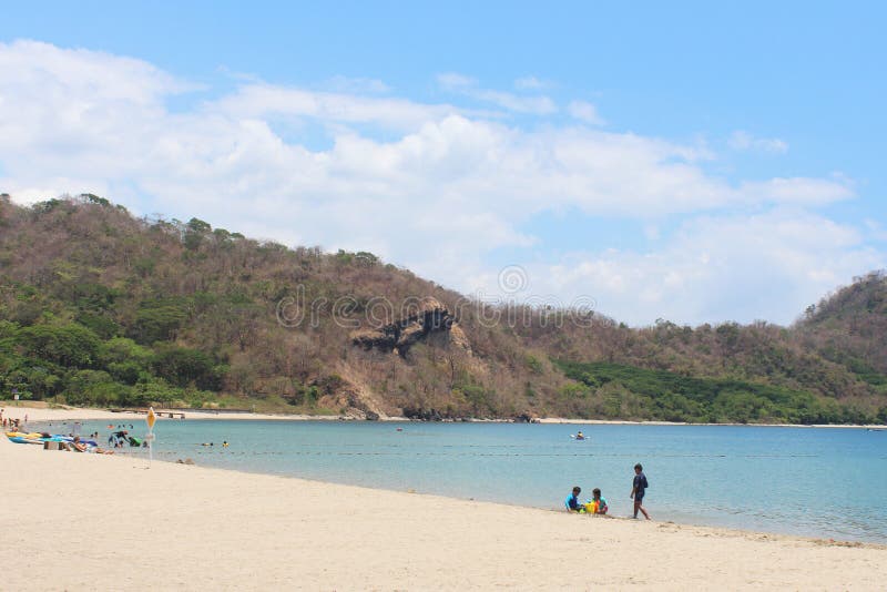 Pico de Loro Beach and Country Club beach view in Nasugbu, Batangas, Philippines. BATANGAS, PH - DEC. 5: Pico de Loro Beach and Country Club beach view on royalty free stock image Pico de Loro Beach and Country Club beach view in Nasugbu, Batangas, Philippines. BATANGAS, PH - DEC. 5: Pico de Loro Beach and Country Club beach view on royalty free stock image