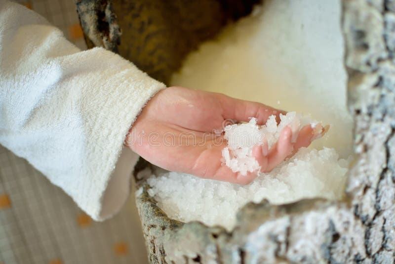 Picture of Bowl Full of Crushed Ice and Hand with Ice Stock Image