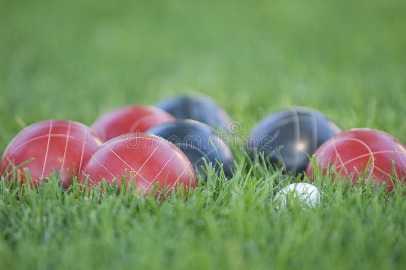 Picture of Colourful Bocce Balls on the Lawn Under the Sunlight with a