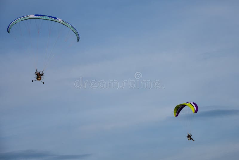 Motorized Hang Glider Soaring in the Blue Sky Stock Photo Image of