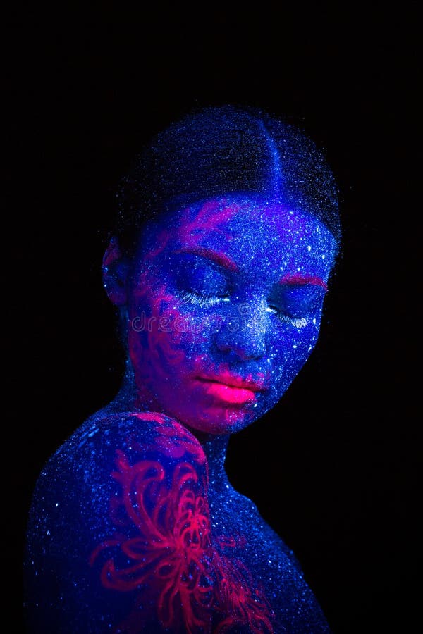 Picture of a pink jellyfish on the shoulder and face. Blue girl alien sleeps. royalty free stock photography Picture of a pink jellyfish on the shoulder and face. Blue girl alien sleeps. royalty free stock photography