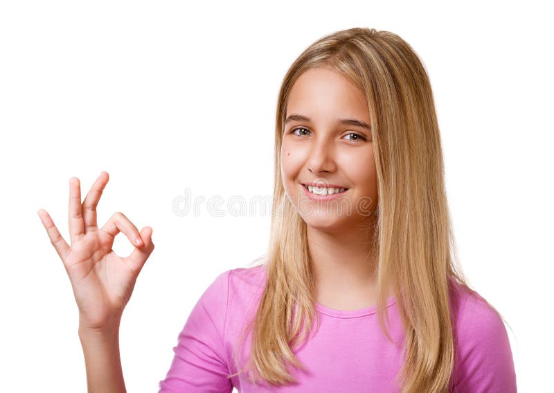 Picture of pretty young girl showing ok sign.Isolated stock photo Picture of pretty young girl showing ok sign.Isolated stock photo