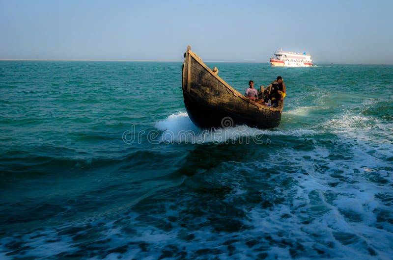 Picture of a sailor on a boat going to St. Martin's Island Bay of Cox's Bazar