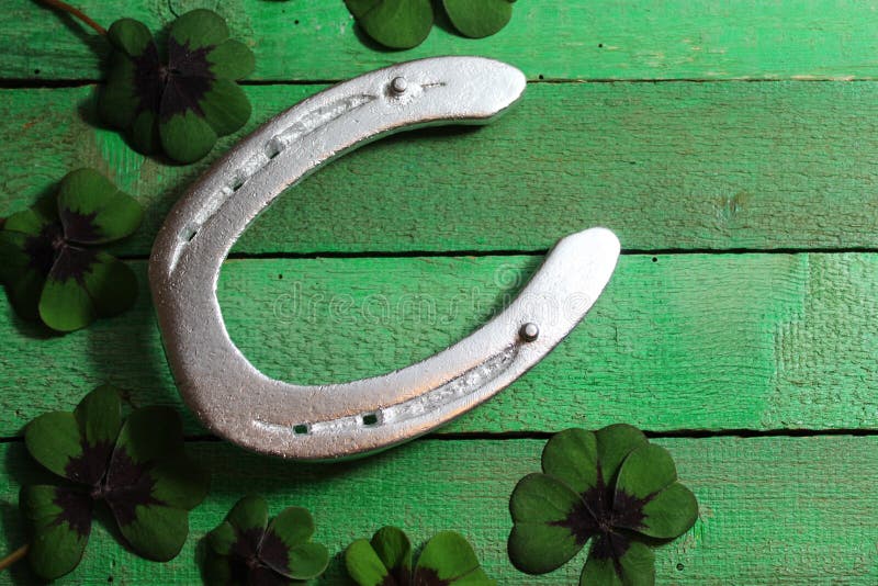 Horseshoe and lucky clover