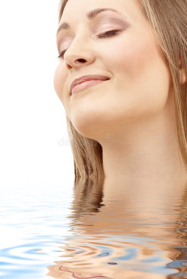Picture of smiling woman in water royalty free stock photos