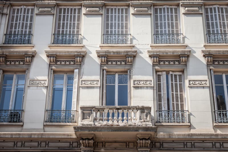 Typical Haussmann style facades, from the 19th century, traditional in the city centers of French cities such as Paris and Lyon royalty free stock images Typical Haussmann style facades, from the 19th century, traditional in the city centers of French cities such as Paris and Lyon royalty free stock images
