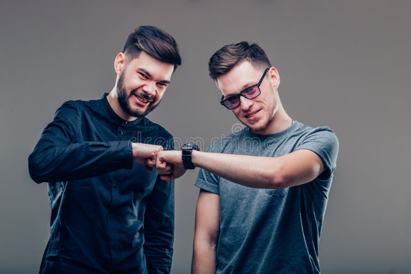 Two best friends men looking at each other and showing unity of their friendship royalty free stock photo Two best friends men looking at each other and showing unity of their friendship royalty free stock photo