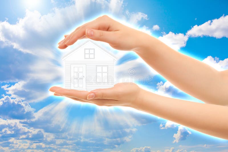Picture of woman's hands holding a house stock images