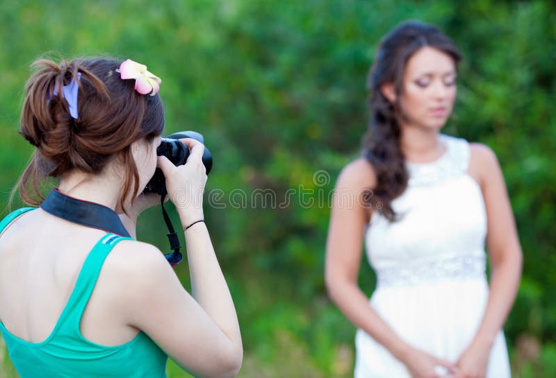 Picture of a woman photographer making a photo