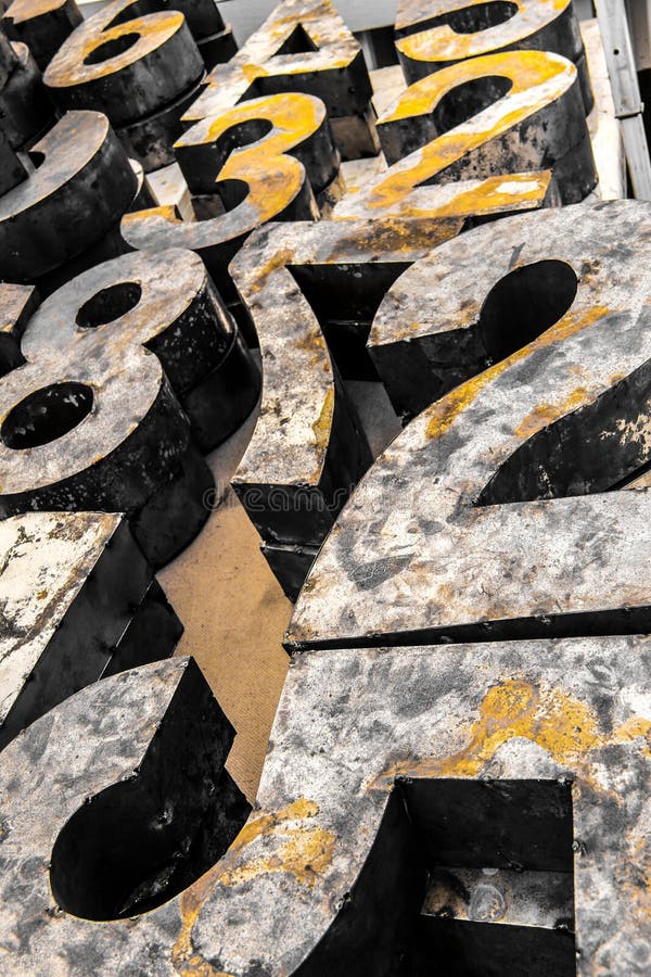 Yellow vintage rusty numbers stock images Yellow vintage rusty numbers stock images