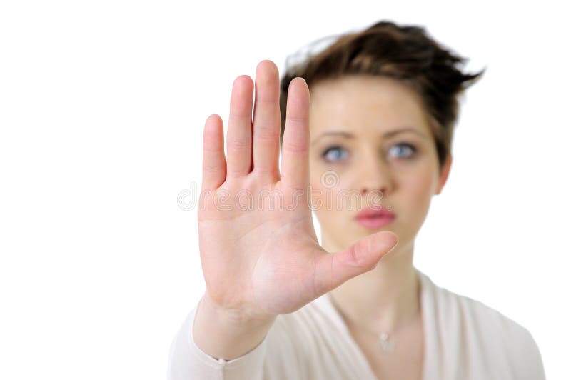Picture of young woman making stop gesture royalty free stock photo