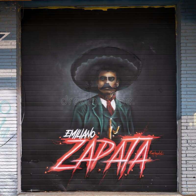 Mural featuring Emiliano Zapata by renowned muralist Theo Ponchaveli in the Tin District of Dallas, Texas. Pictured is a mural featuring Emiliano Zapata by