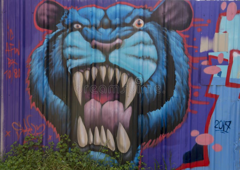 Blue Tiger mural by Theo Ponchaveli, Dallas, Texas