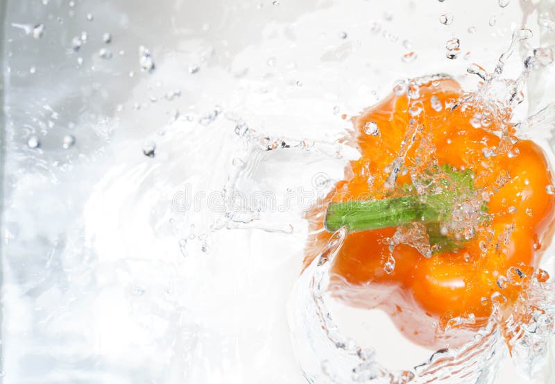 Paprikas into the water stock photo. Image of bubble 133889540