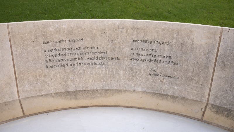 Pictured is the poem by officer Josh Rosenthal  for the police memorial that features a sculpture titled `Radiant Shield` by Shane Allbirtton and Norman Lee at the police station in the City of Richardson, Texas.  It is part of a police memorial, it`s surrounding low limestone wall being engraved on the inside with a quote, a poem, a reference to a fallen officer, and a dedication to the officers of the Richardson Police Department who have given their lives while serving and protecting the citizens.  The poem by police officer Josh Rosenthal is titled `Missing`. Pictured is the poem by officer Josh Rosenthal  for the police memorial that features a sculpture titled `Radiant Shield` by Shane Allbirtton and Norman Lee at the police station in the City of Richardson, Texas.  It is part of a police memorial, it`s surrounding low limestone wall being engraved on the inside with a quote, a poem, a reference to a fallen officer, and a dedication to the officers of the Richardson Police Department who have given their lives while serving and protecting the citizens.  The poem by police officer Josh Rosenthal is titled `Missing`.