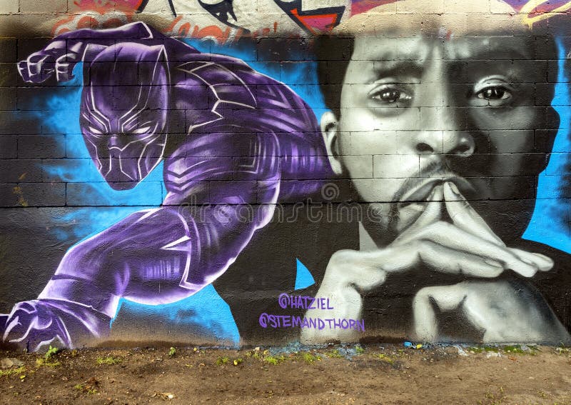 Mural in honor of Chadwick Boseman in the Fabrication Yard in Dallas, Texas. Pictured is a street mural honoring American actor Chadwick Aaron Boseman who died royalty free stock photography