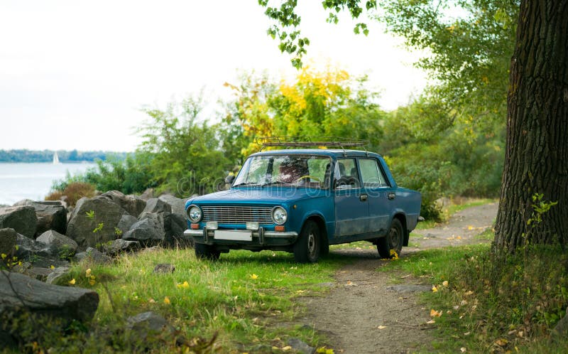 Autumn in UK. Old Car on the Lake Shore Stock Photo - Image of district ...