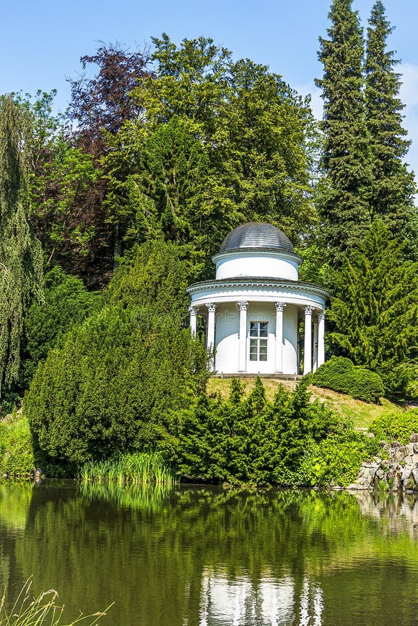 Picturesque small lake with pavilion in Castle Park of Kassel, Germany