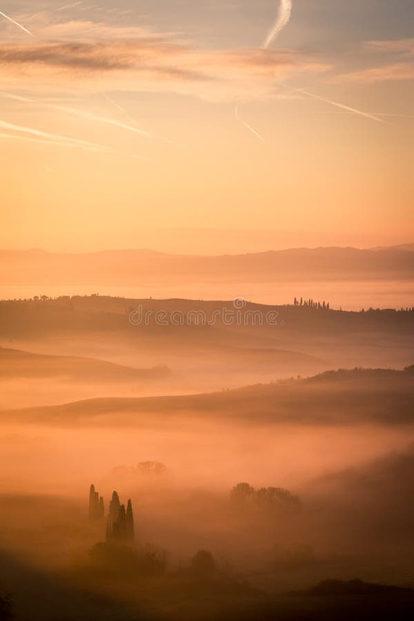 Picturesque sunrise misty Tuscany, Italy
