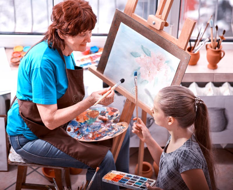 Pictură artistică în studio. bunica autentică și copiii. stock photo
