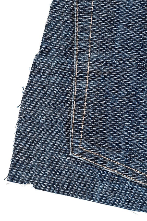 Piece of blue jeans fabric stock photo. Image of fringe - 144992134