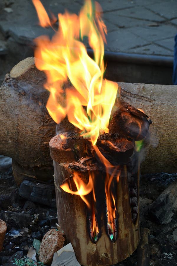 A piece of burning wood stock photo. Image of colorfull - 131494968