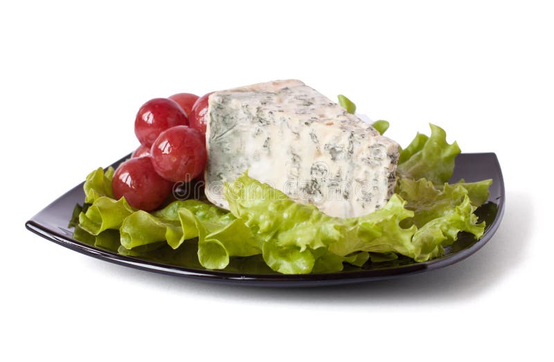Piece of cheese and grapes