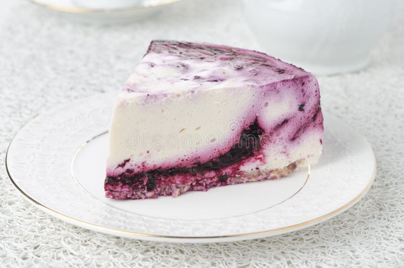 Piece of cheesecake with blueberries