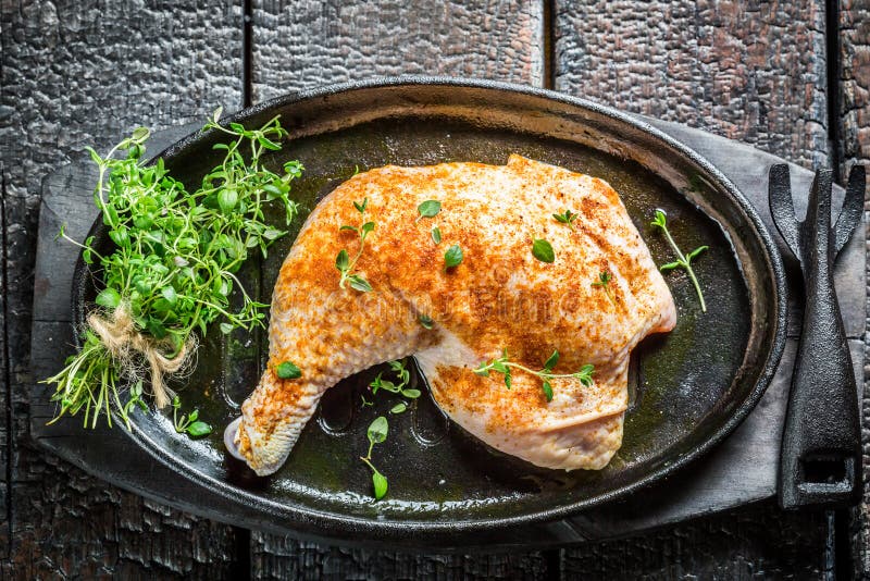 Piece of Chicken with Herbs and Spices Ready To Grill Stock Image
