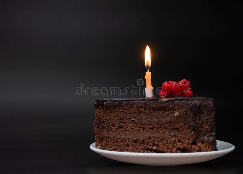 Piece of Chocolate Birthday Cake with One Burning Candle on White Plate on  Deep Black Background. Birthday Party Stock Photo - Image of candle,  background: 207074208