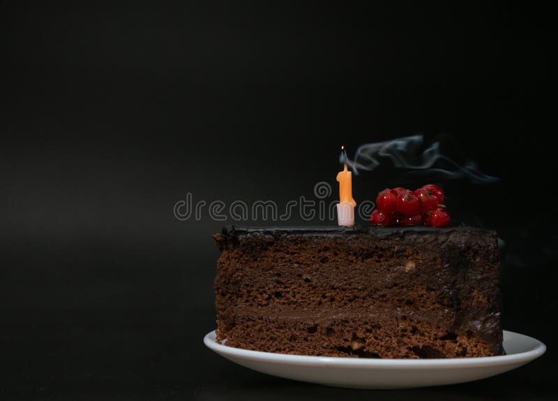 Piece Of Chocolate Birthday Cake With One Extinguished Candle On White Plate On Deep Black Background Birthday Party Stock Image Image Of Homemade Decoration