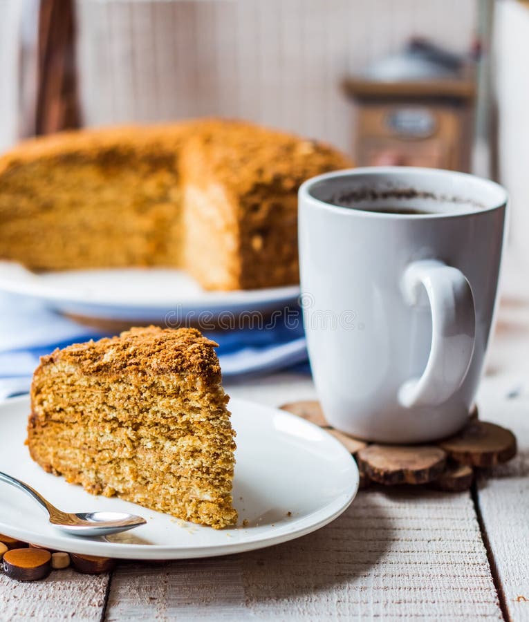 A Piece of Honey Cake with Sour Cream and Nuts Stock Photo - Image of ...