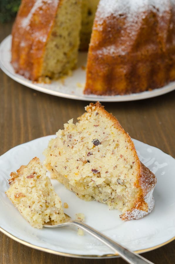 Piece of orange and walnut cake on a plate