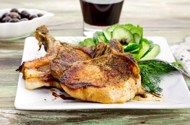 Piece of Pork on a White Plate Stock Photo - Image of palatable ...