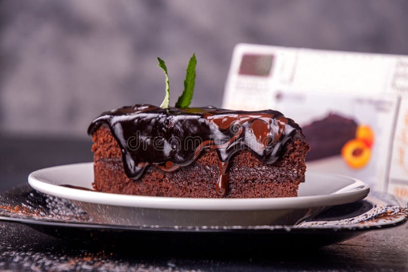 Sachertorte Piece Of Sacher Cake On White Plate Garnish 