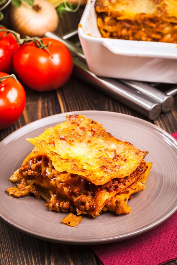 Piece of Tasty Hot Lasagna on a Plate Stock Photo - Image of crispy ...