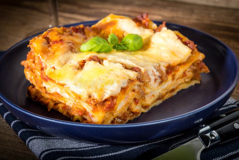 Piece of Tasty Hot Lasagna with Red Wine. Stock Photo - Image of piece ...